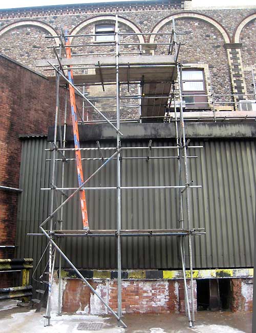 Access tower and walkway for commercial premises.